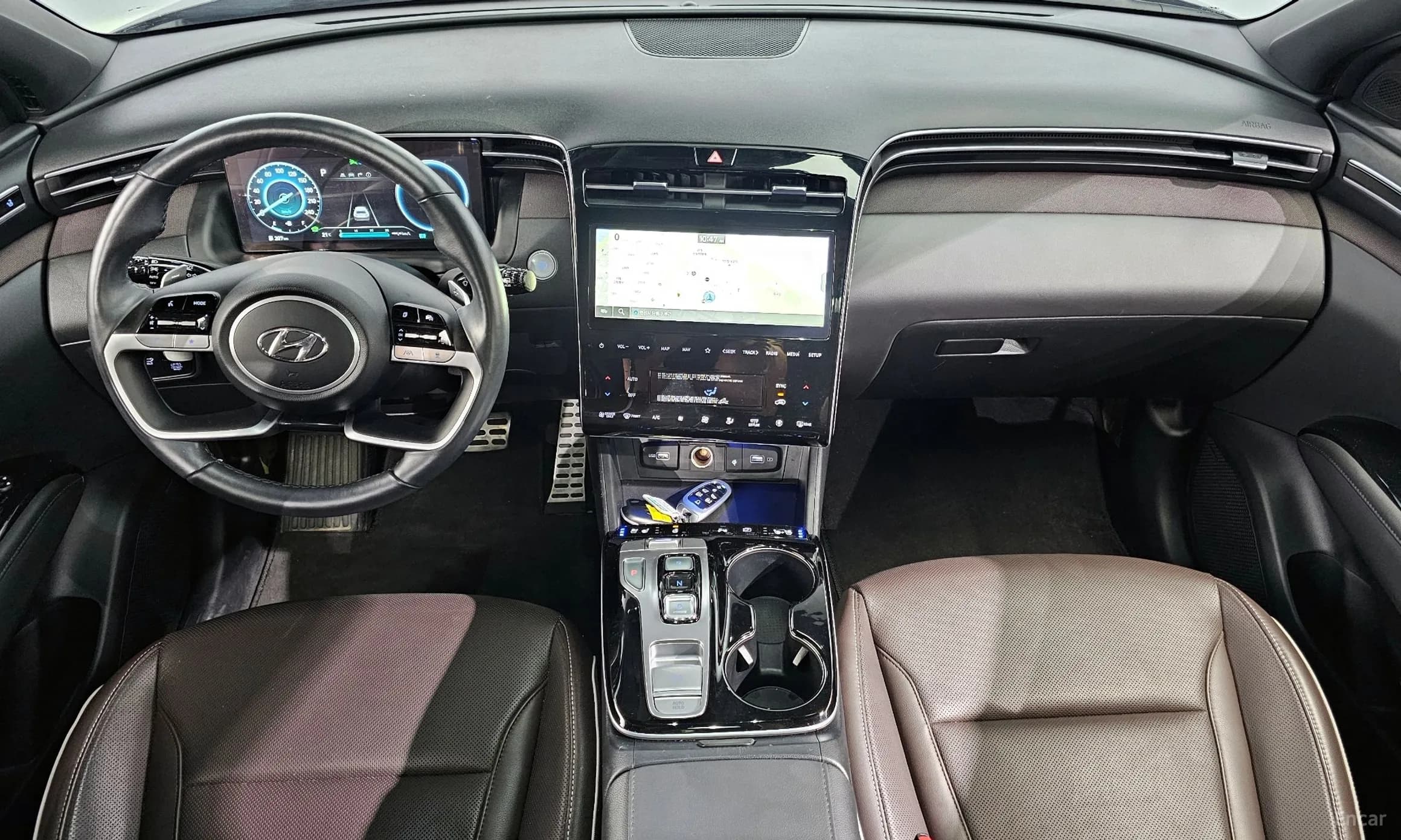 Tucson Hybrid (NX4)