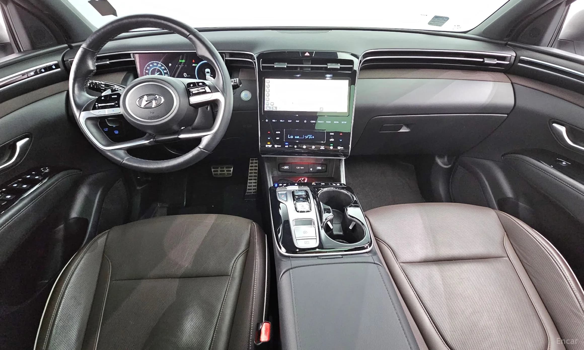 Tucson Hybrid (NX4)