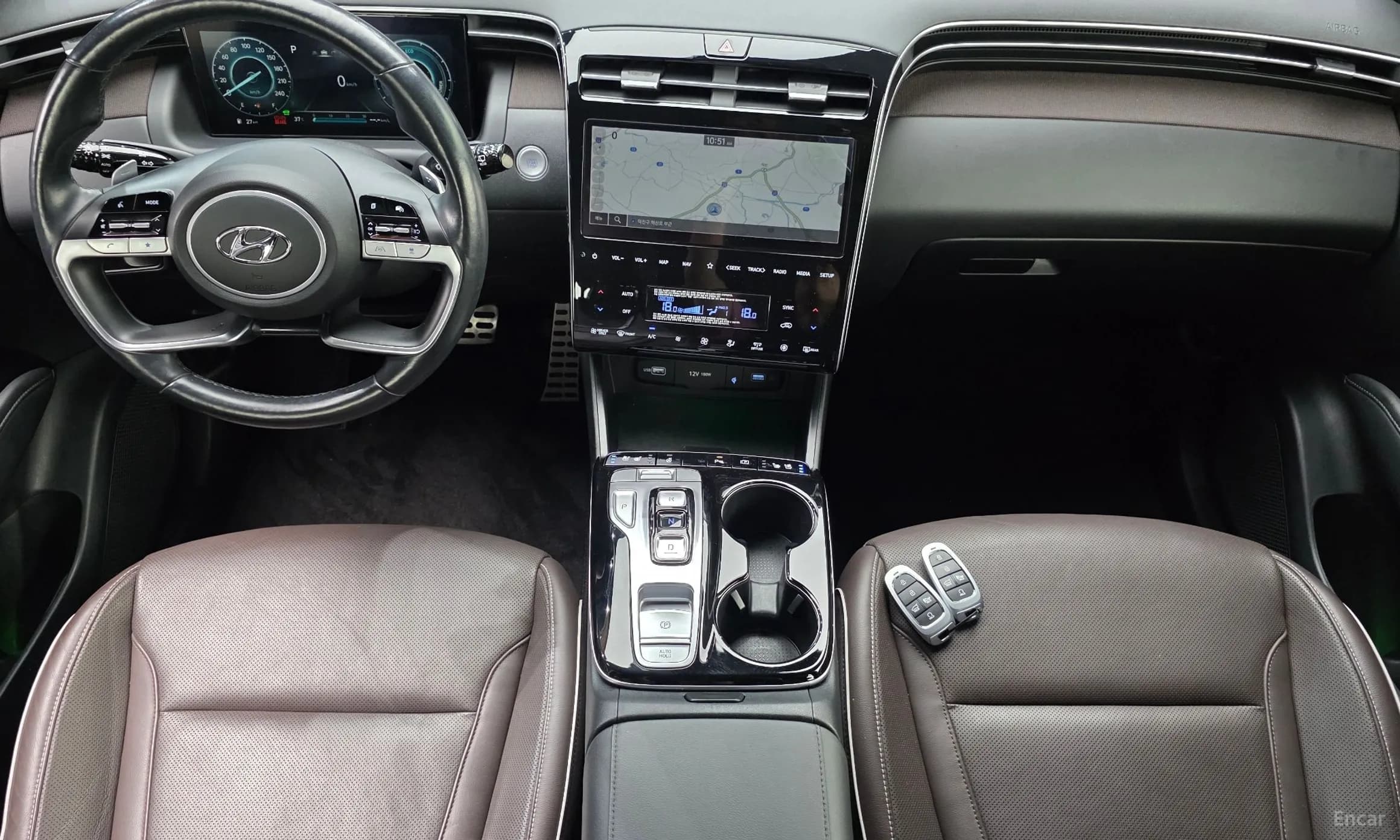 Tucson Hybrid (NX4)