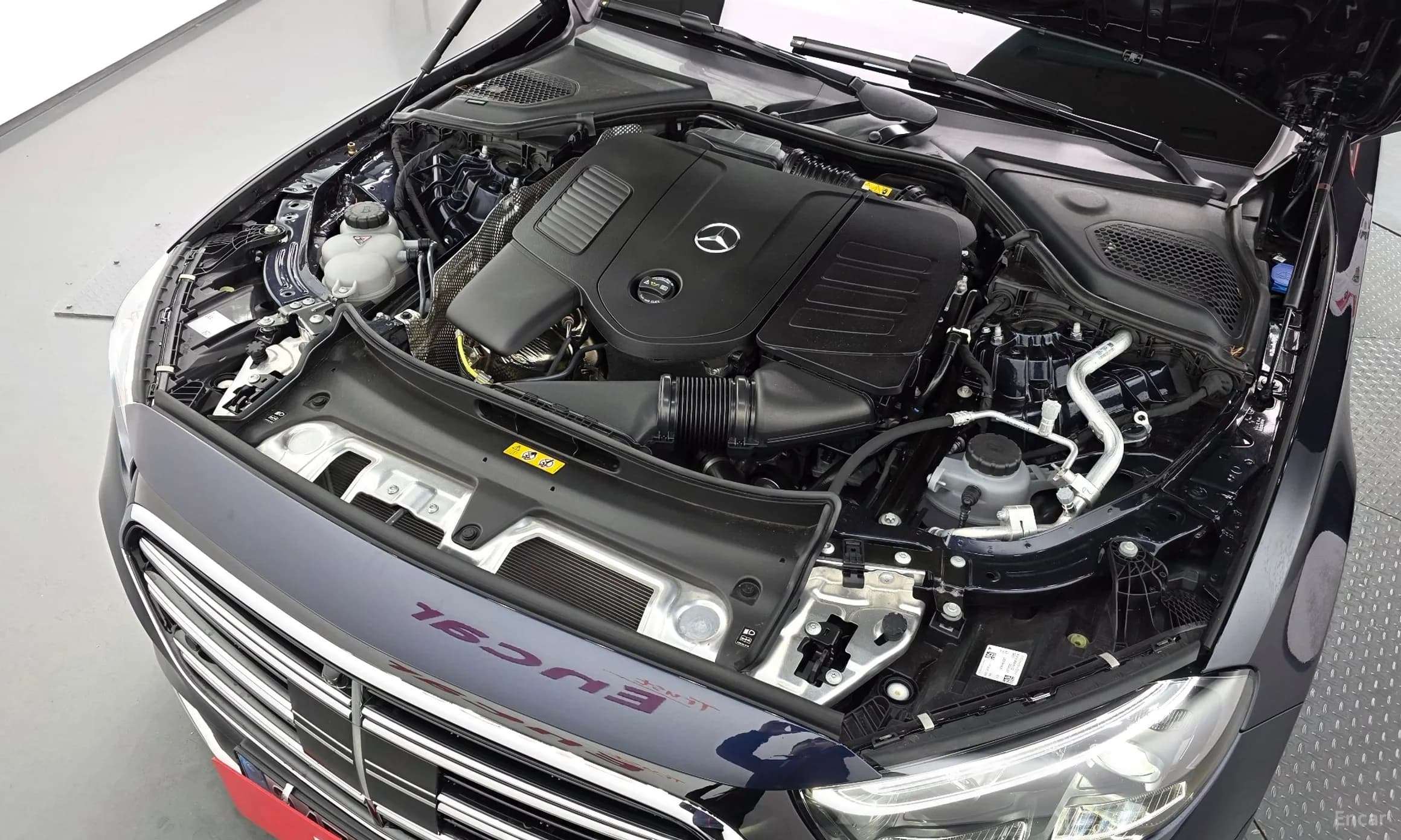 E-Class W214