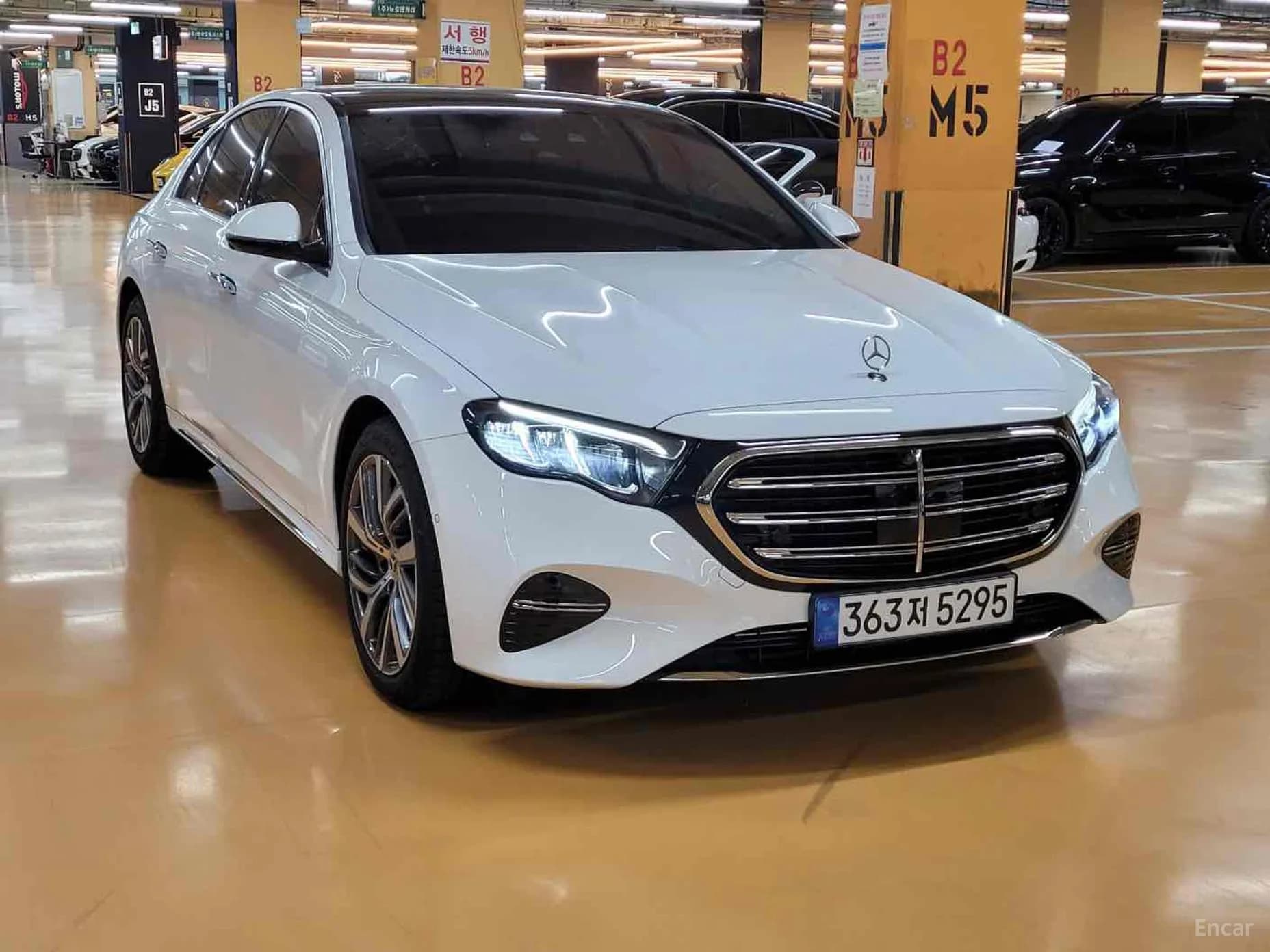 E-Class W214