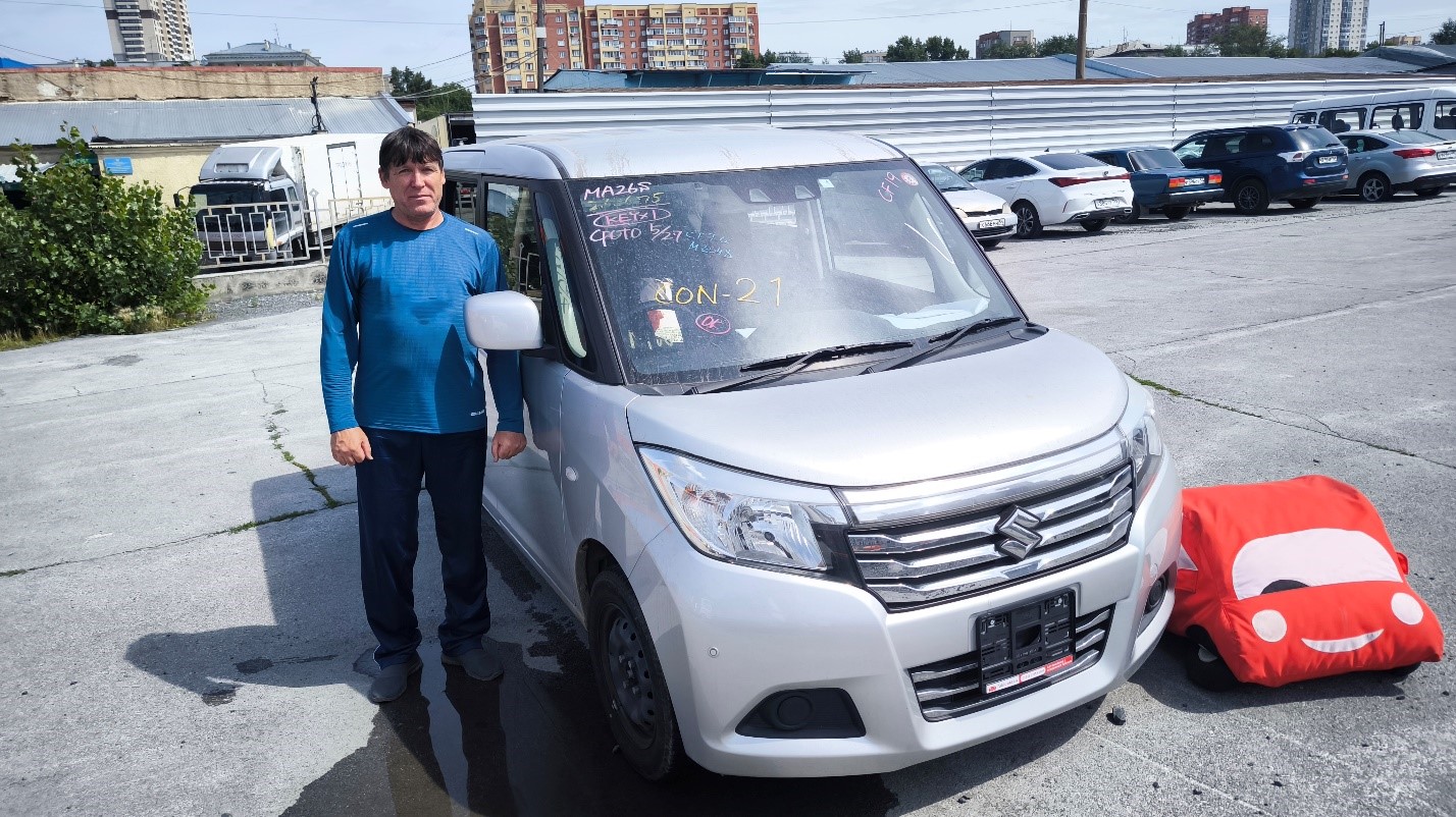 Александр с Suzuki Solio